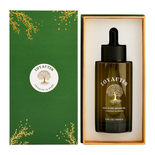 Pure arganolie van LOYAUTÉS in donkere fles met druppelaar, in groene geschenkdoos